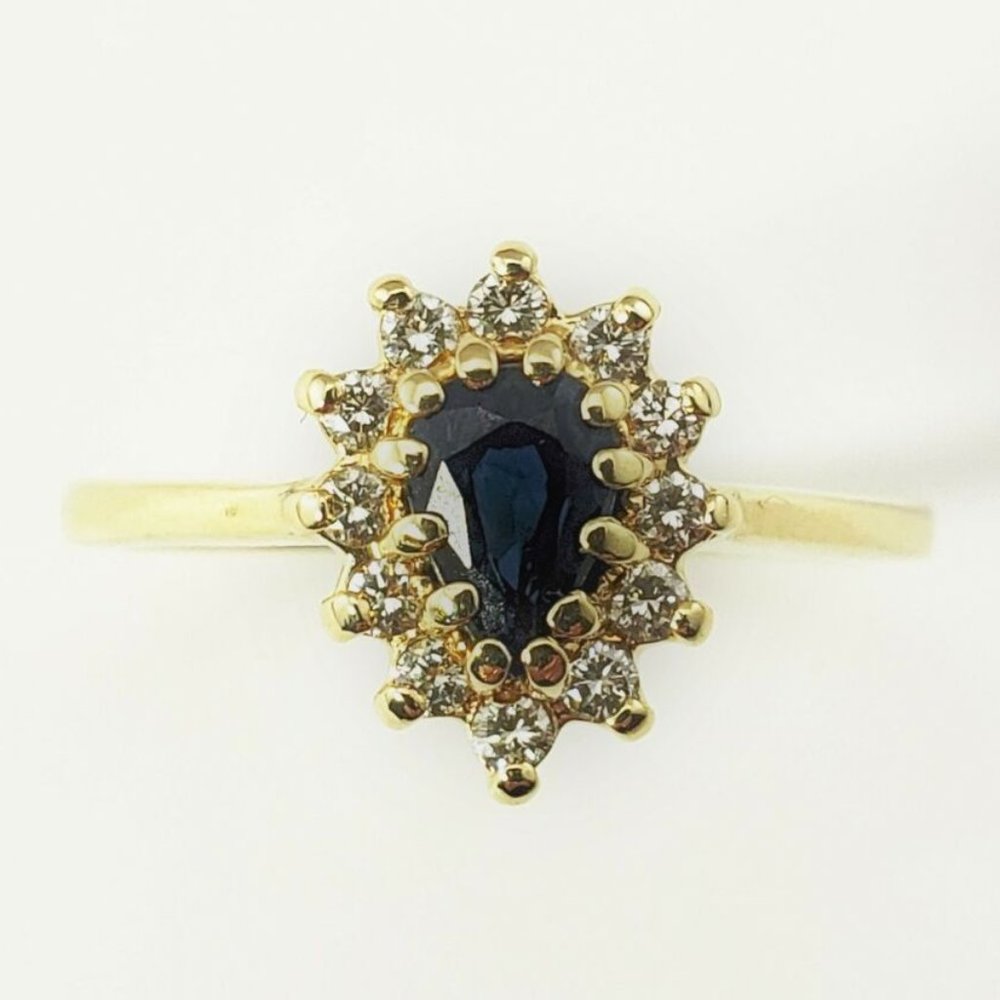 Gold Ring with Deep Blue Teardrop Center and Diamond Halo